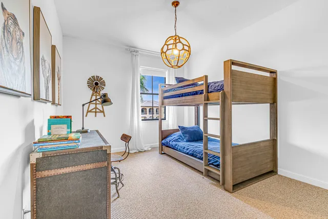 a balcony with furniture and garden view