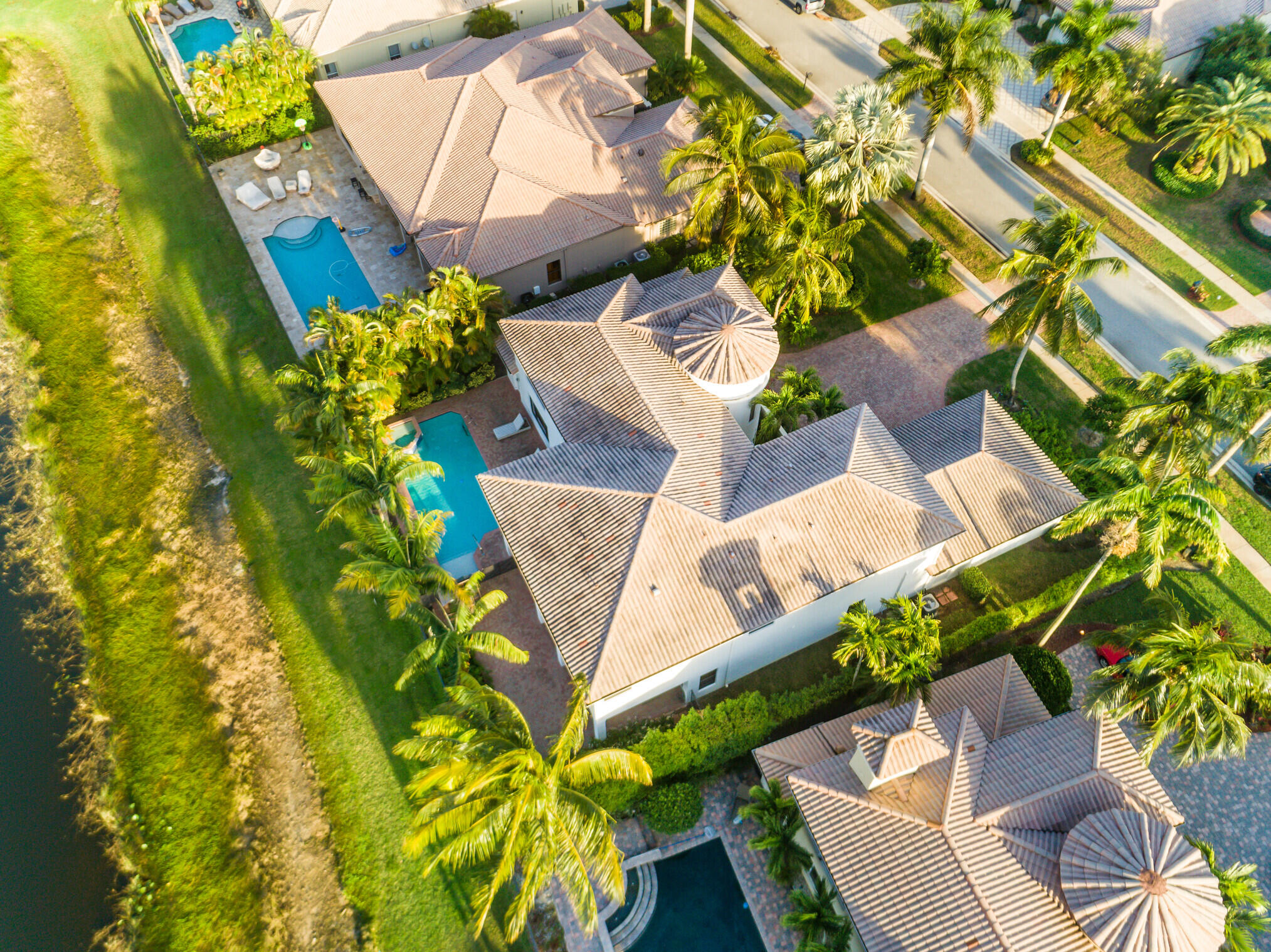 11663 Sunrise View Lane Wellington, FL 33449 - Photo 43 of 43 view of a house with a yard and sitting area