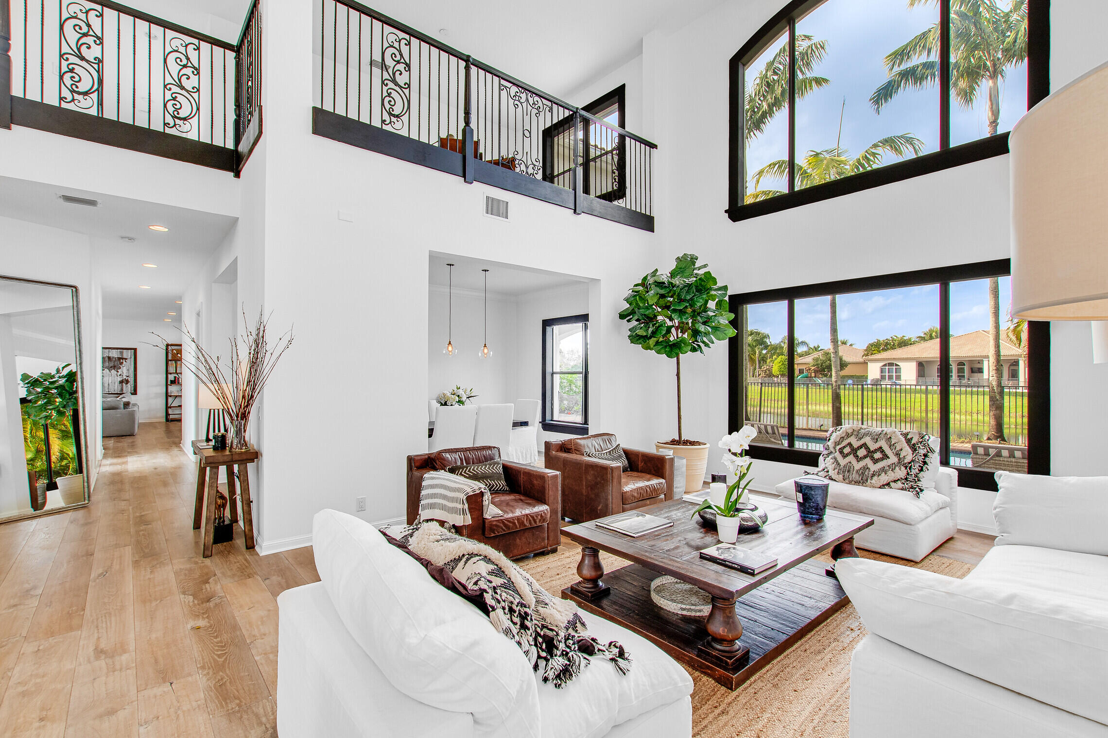 11663 Sunrise View Lane Wellington, FL 33449 - Photo 6 of 43 a living room with furniture