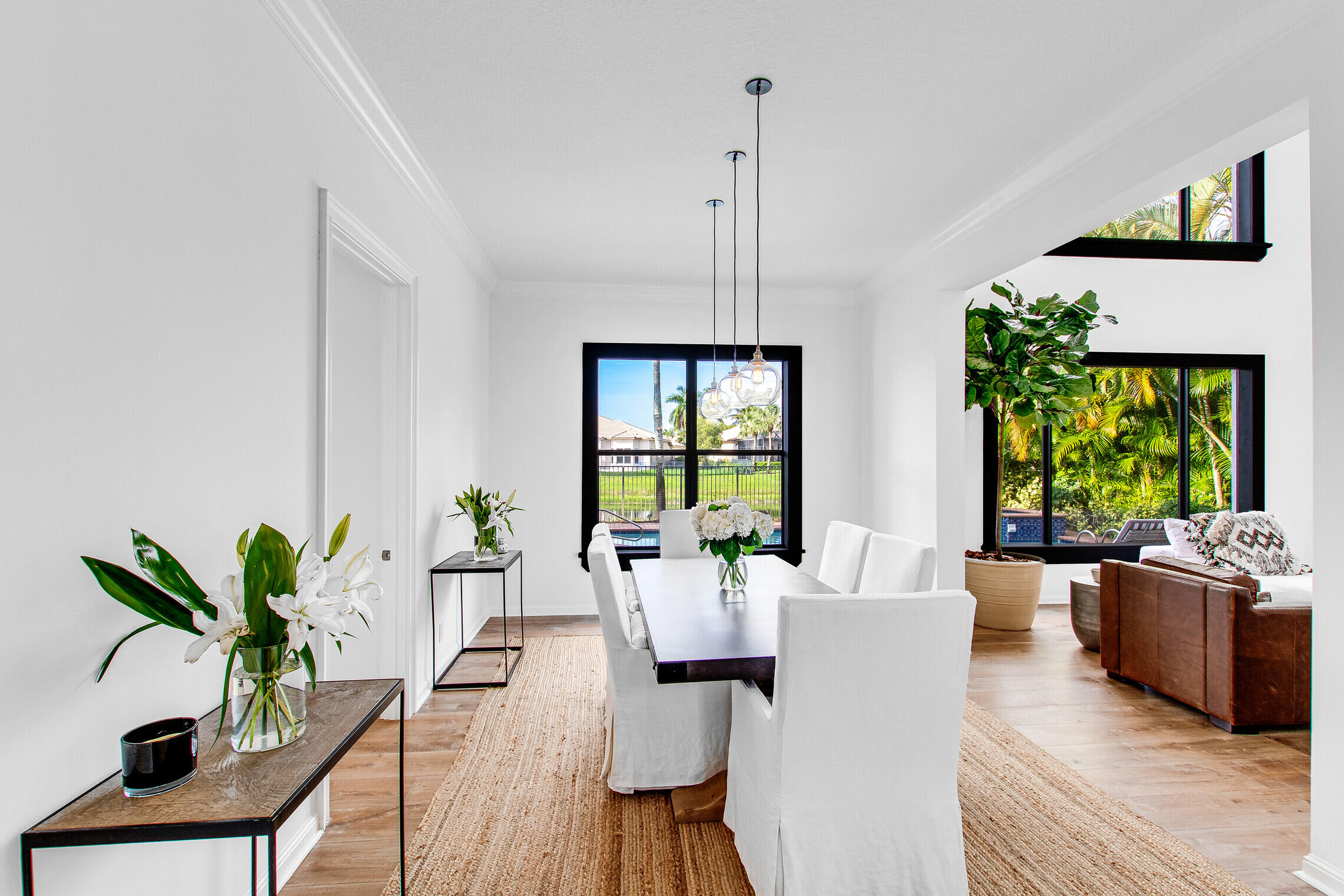 11663 Sunrise View Lane Wellington, FL 33449 - Photo 9 of 43 a living room with furniture and a potted plant