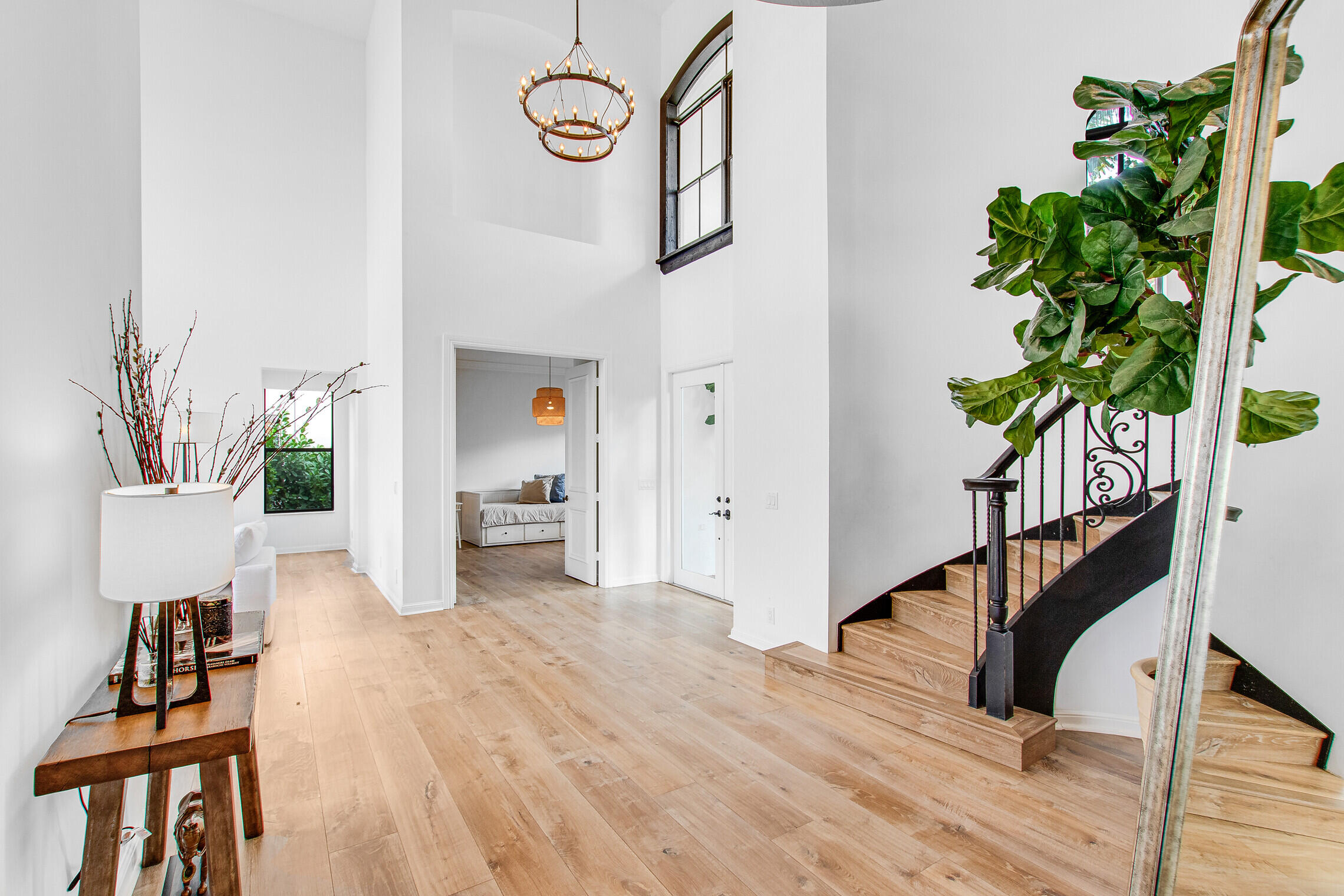 11663 Sunrise View Lane Wellington, FL 33449 - Photo 10 of 43 a view of an entryway with wooden floor