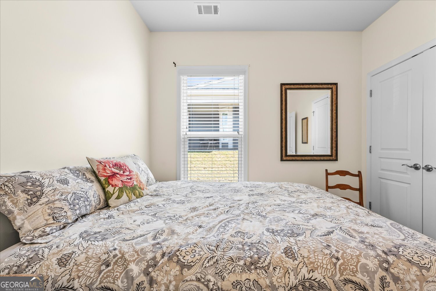 1071 Southern Pne Road Greensboro, GA 30642 - Photo 13 of 48 a bedroom with a bed and a dresser