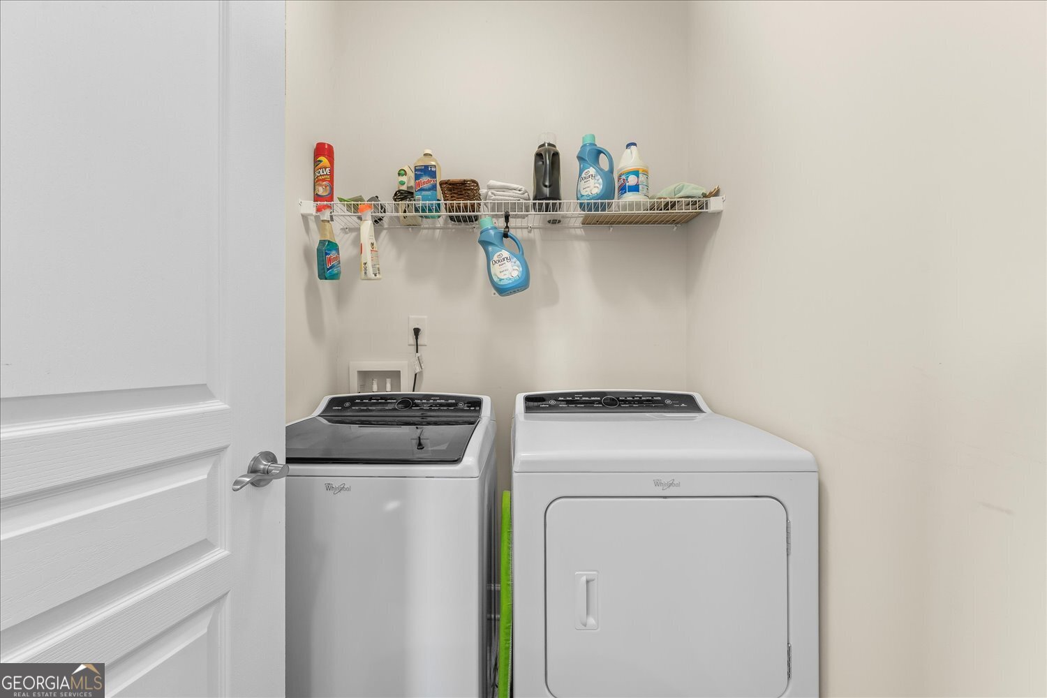 1071 Southern Pne Road Greensboro, GA 30642 - Photo 15 of 48 a view of storage and utility room with washer and dryer