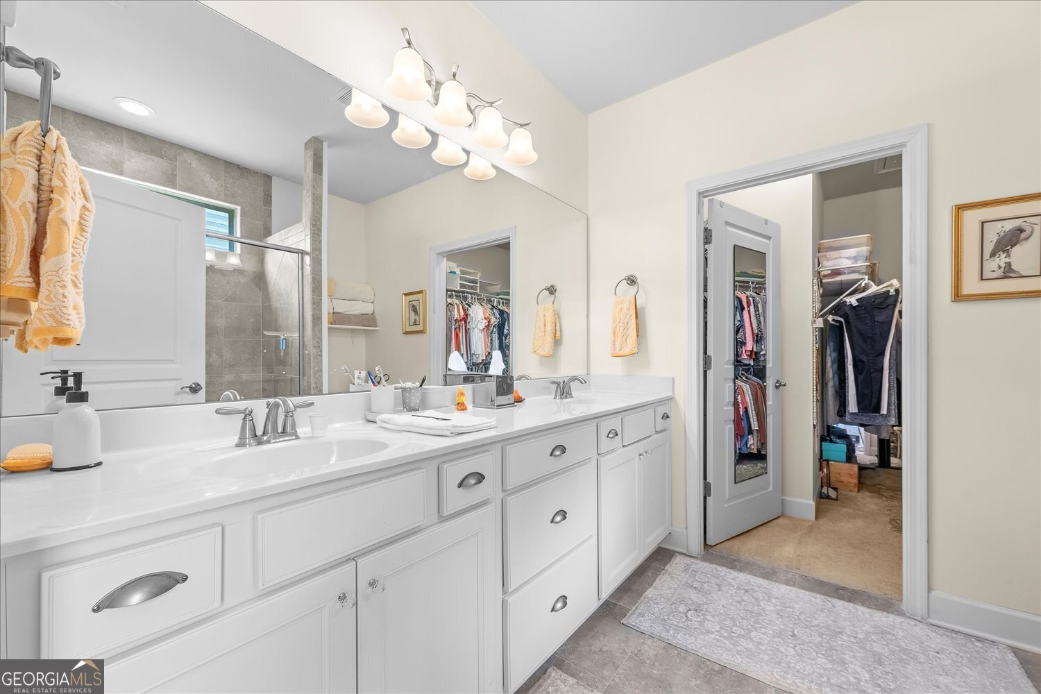 1071 Southern Pne Road Greensboro, GA 30642 - Photo 17 of 48 a spacious en suite bathroom with double sink and a mirror