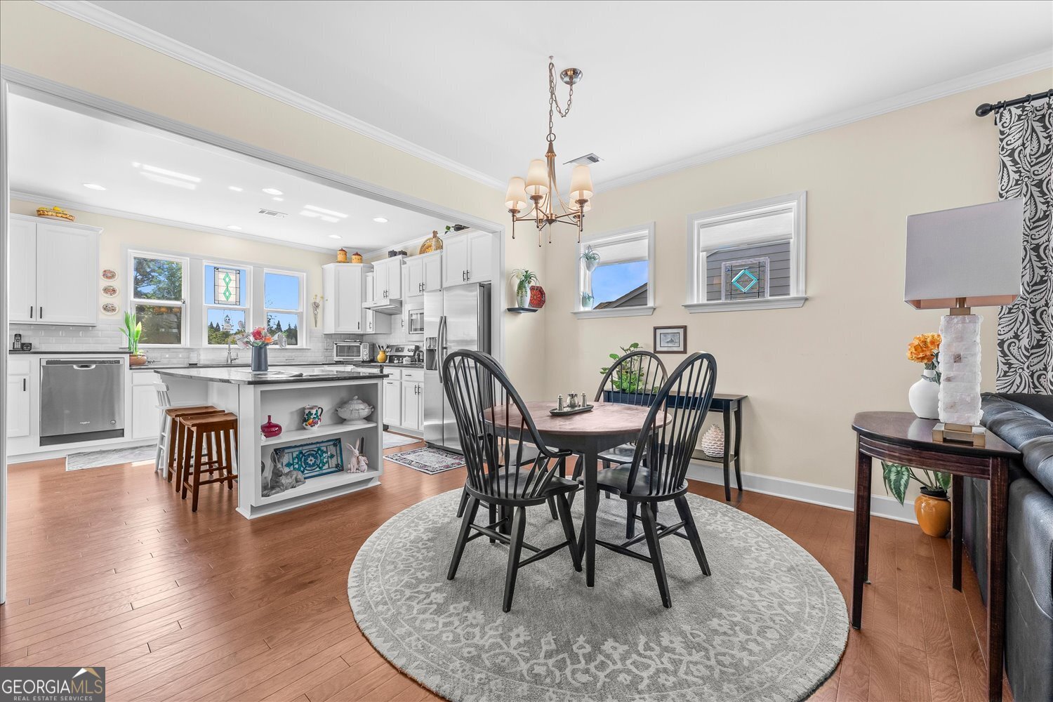 1071 Southern Pne Road Greensboro, GA 30642 - Photo 21 of 48 a dining room with furniture and wooden floor