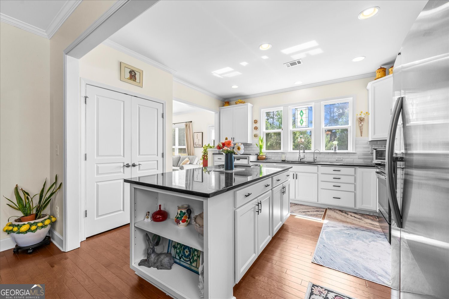 1071 Southern Pne Road Greensboro, GA 30642 - Photo 23 of 48 a kitchen with stainless steel appliances granite countertop a stove and a refrigerator