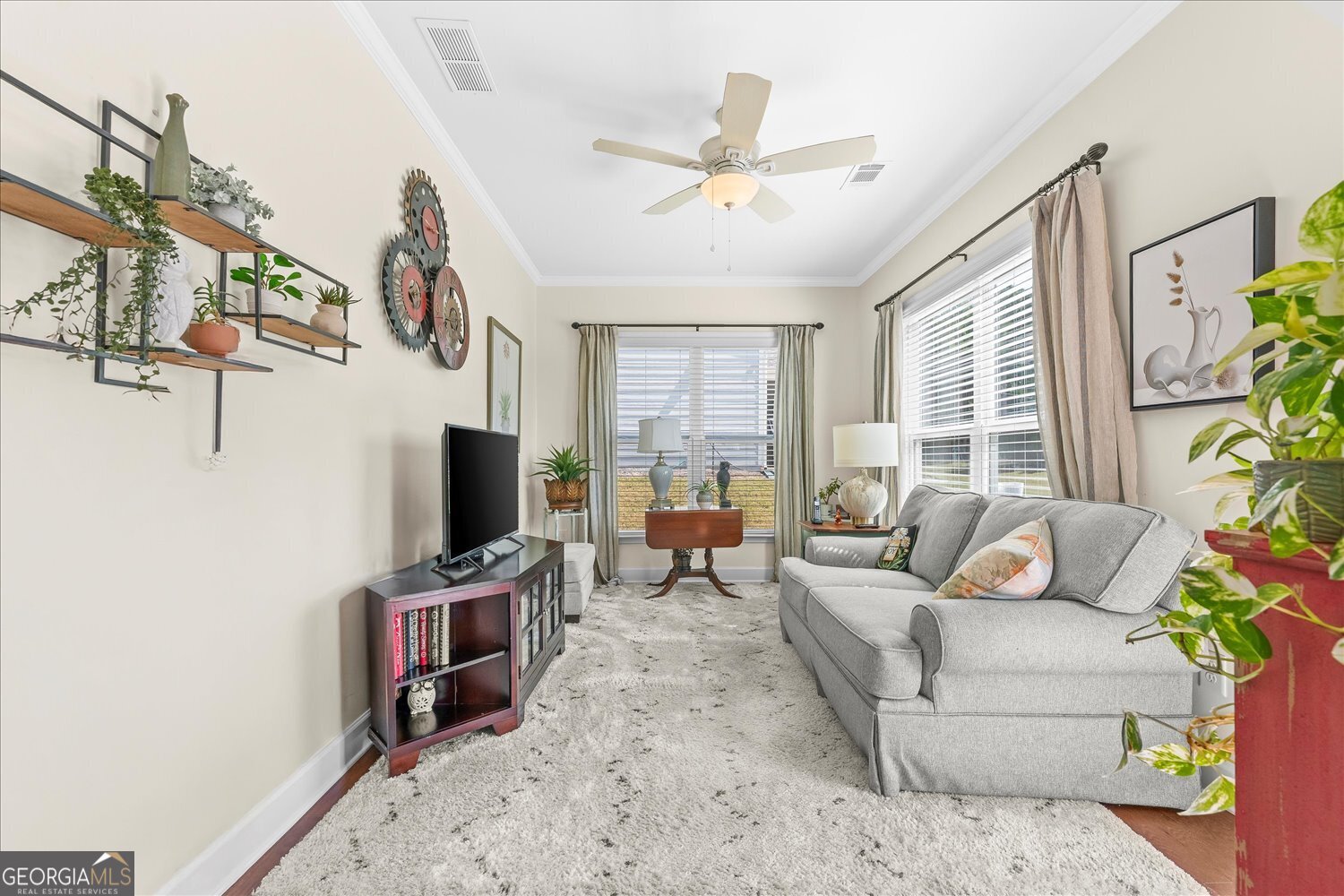 1071 Southern Pne Road Greensboro, GA 30642 - Photo 27 of 48 a living room with furniture and a flat screen tv