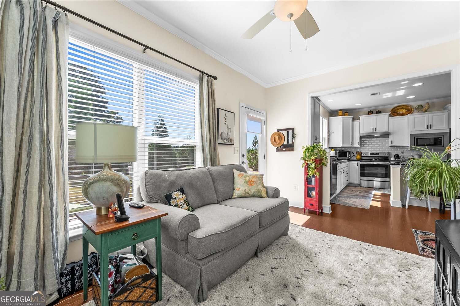 1071 Southern Pne Road Greensboro, GA 30642 - Photo 28 of 48 a living room with furniture and a large window