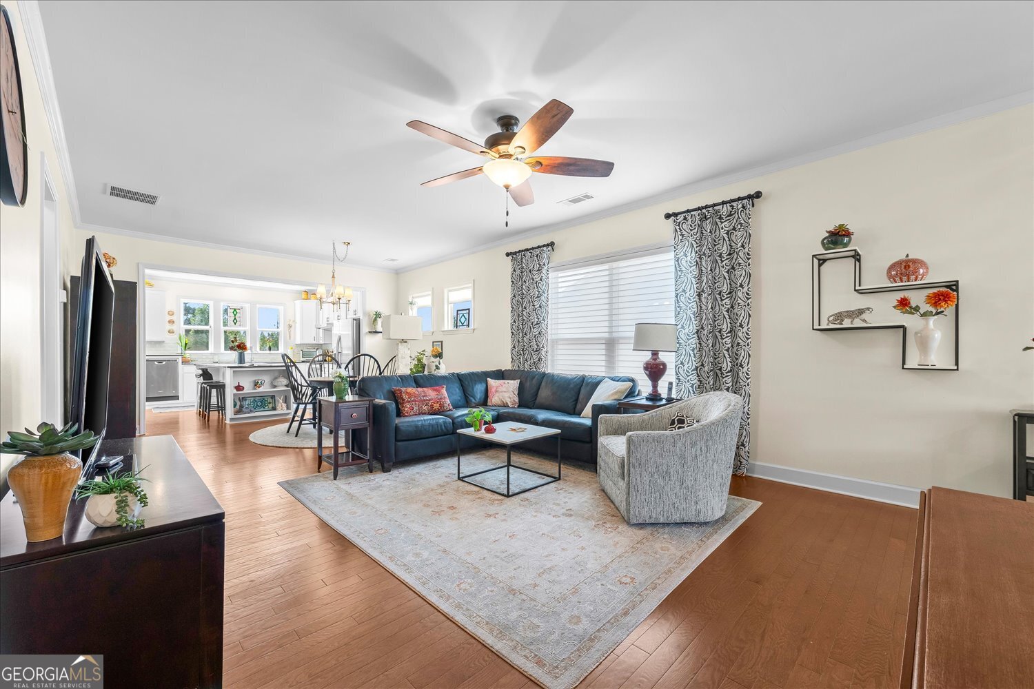 1071 Southern Pne Road Greensboro, GA 30642 - Photo 9 of 48 a living room with furniture and a flat screen tv