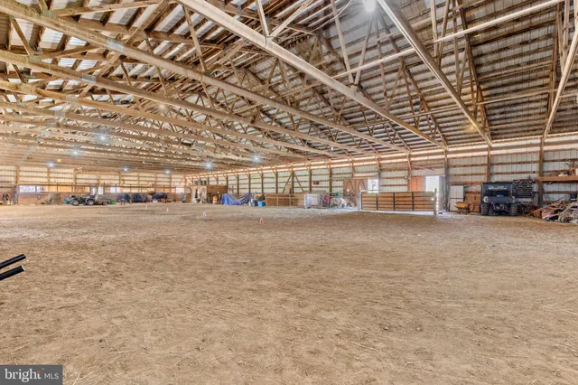 a bedroom with bed and window
