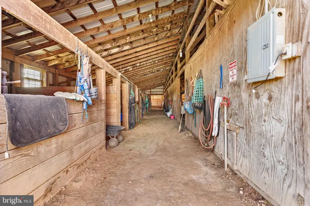 a room with gym equipment and a mirror