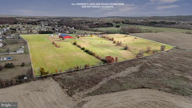 a lobby with furniture and a chandelier