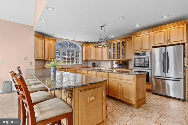 a spacious bathroom with a double vanity sink double vanity and a mirror