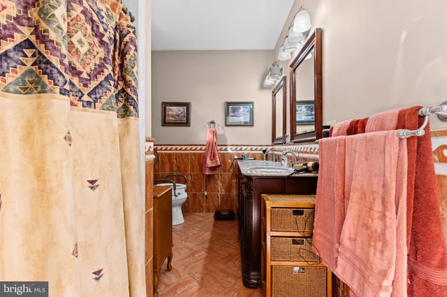 an aerial view of a house with a ocean view