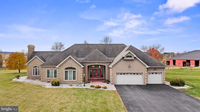 a view of a lake with houses in the back
