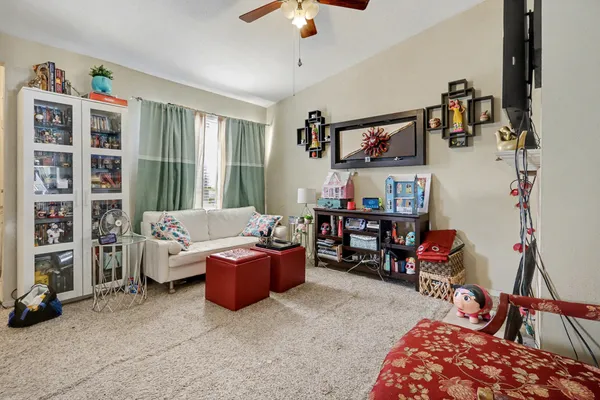 a living room with furniture and a window