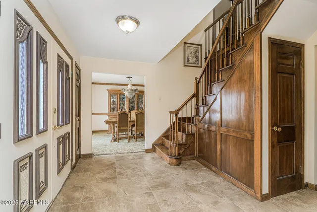 a view of an entryway with staircase