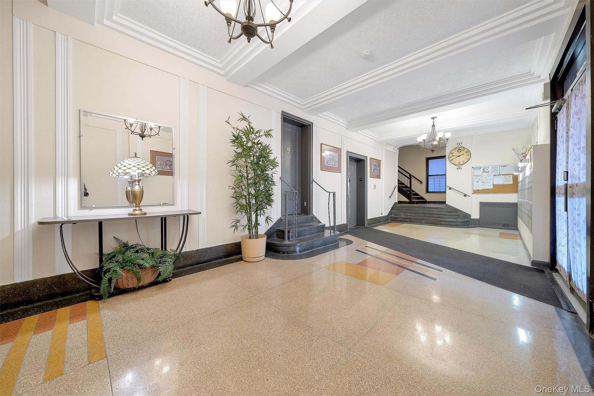 2962 Decatur Avenue, Unit 5 Bronx, NY 10458 - Photo 14 of 17 a view of a lobby with furniture and floor to ceiling window