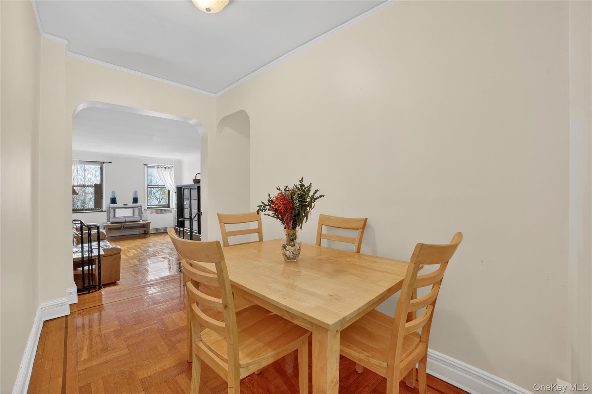 2962 Decatur Avenue, Unit 5 Bronx, NY 10458 - Photo 6 of 17 a view of a dining room with furniture and wooden floor