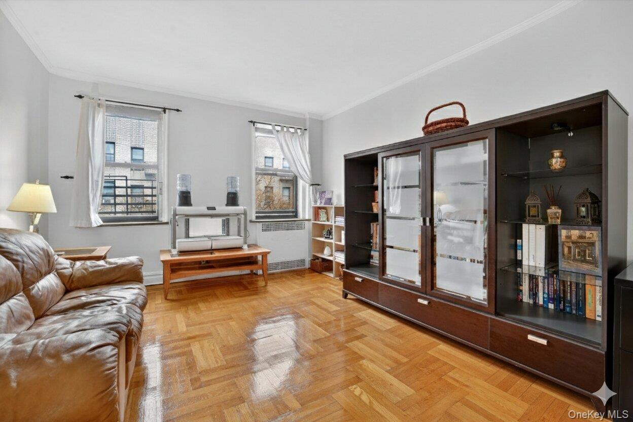 2962 Decatur Avenue, Unit 5 Bronx, NY 10458 - Photo 7 of 17 a living room with furniture and large window