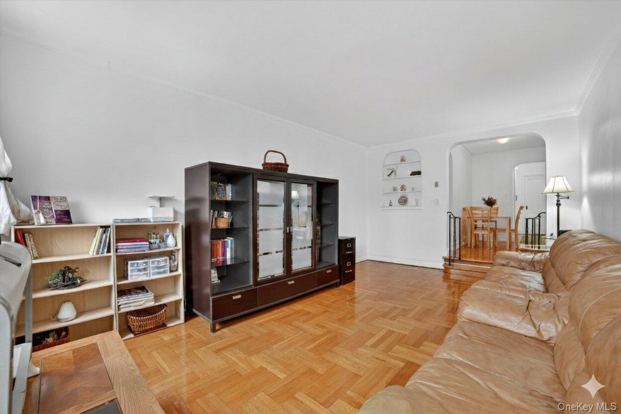 2962 Decatur Avenue, Unit 5 Bronx, NY 10458 - Photo 9 of 17 a view of a livingroom with furniture and window