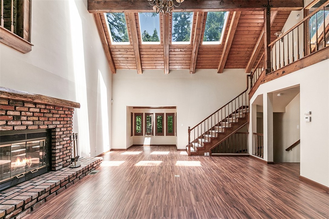 760 Kuffel Canyon Road Lake Arrowhead, CA 92385 - Photo 5 of 24 a view of entryway with wooden floor and a front door