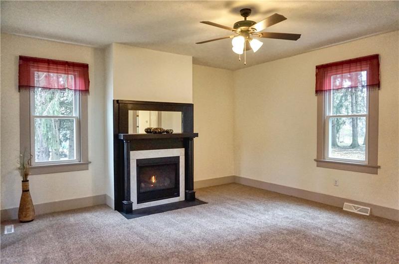 548 Great Belt Road Butler, PA 16002 - Photo 8 of 24 This stunning living area features a gas fireplace complimented with the original woodwork and mantel!