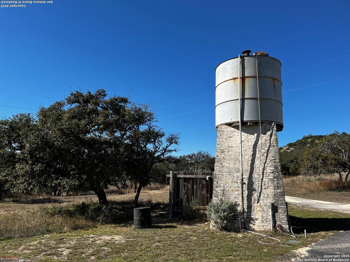 205 Crabapple Road Kendalia, TX 78027 - Photo 4 of 9 a front view of a house with a yard
