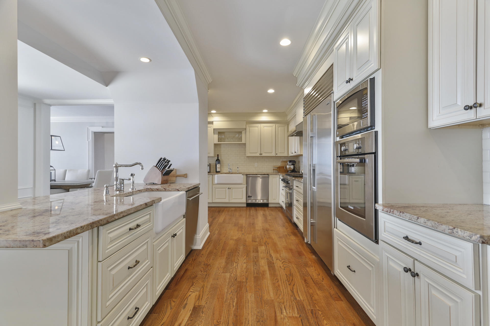 6 Woodland Road Norwalk, CT 06854 - Photo 17 of 47 a large kitchen with cabinets
