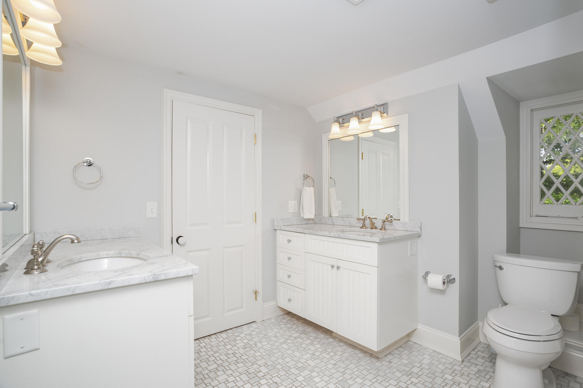 6 Woodland Road Norwalk, CT 06854 - Photo 33 of 47 a bathroom with a granite countertop sink a toilet and a mirror