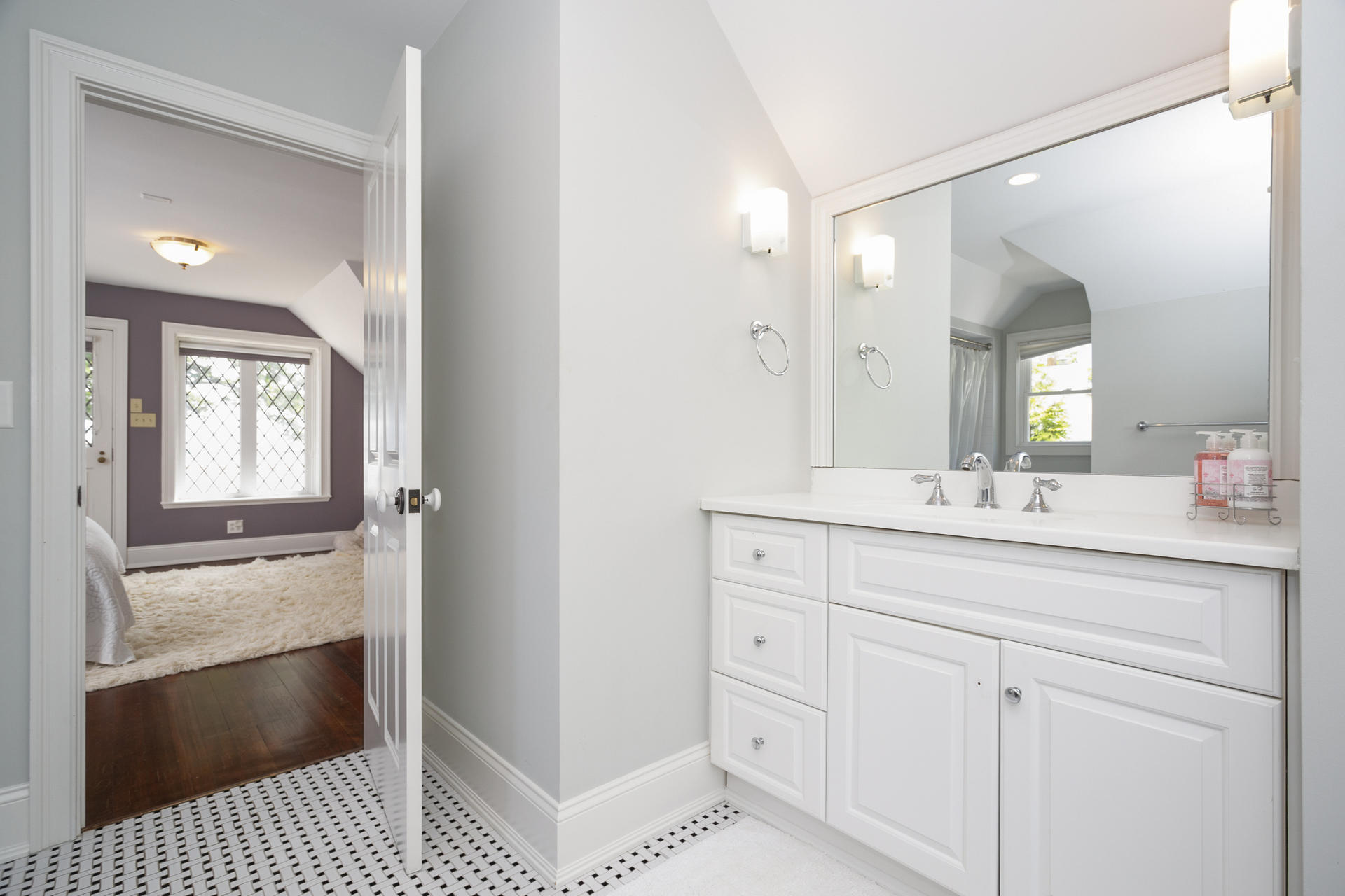 6 Woodland Road Norwalk, CT 06854 - Photo 37 of 47 a bathroom with a sink a mirror and a shower