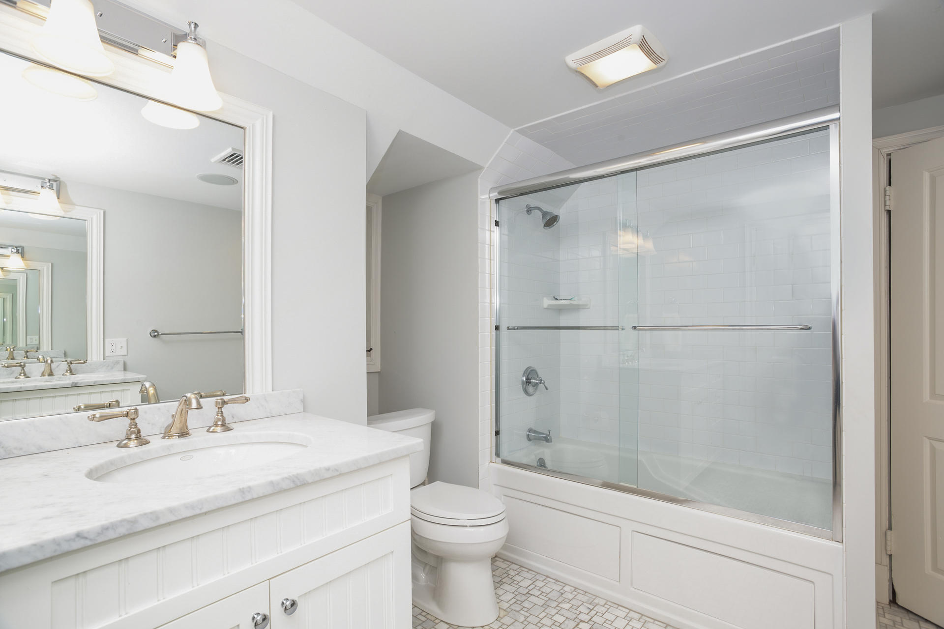 6 Woodland Road Norwalk, CT 06854 - Photo 38 of 47 a bathroom with a granite countertop sink toilet and shower
