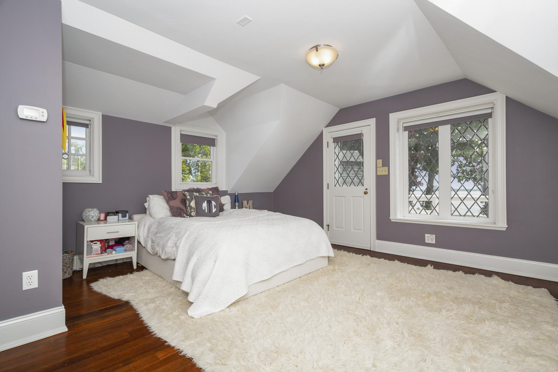 6 Woodland Road Norwalk, CT 06854 - Photo 43 of 47 a spacious bedroom with a bed and a large window
