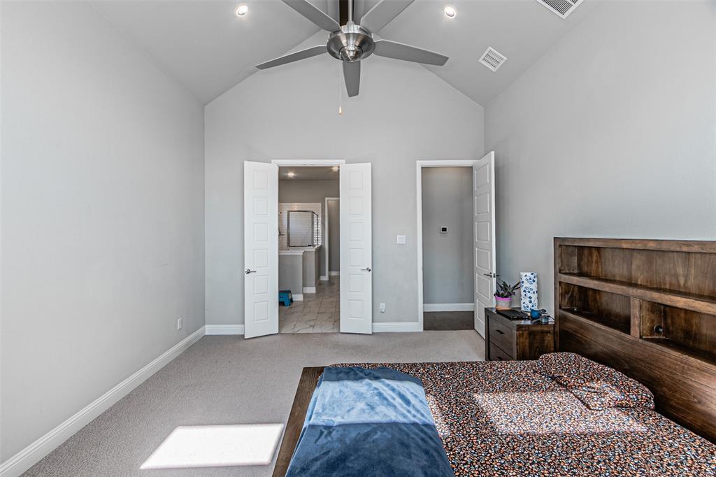 13237 Jonata Street Frisco, TX 75035 - Photo 20 of 39 a living room with a bed furniture and a window