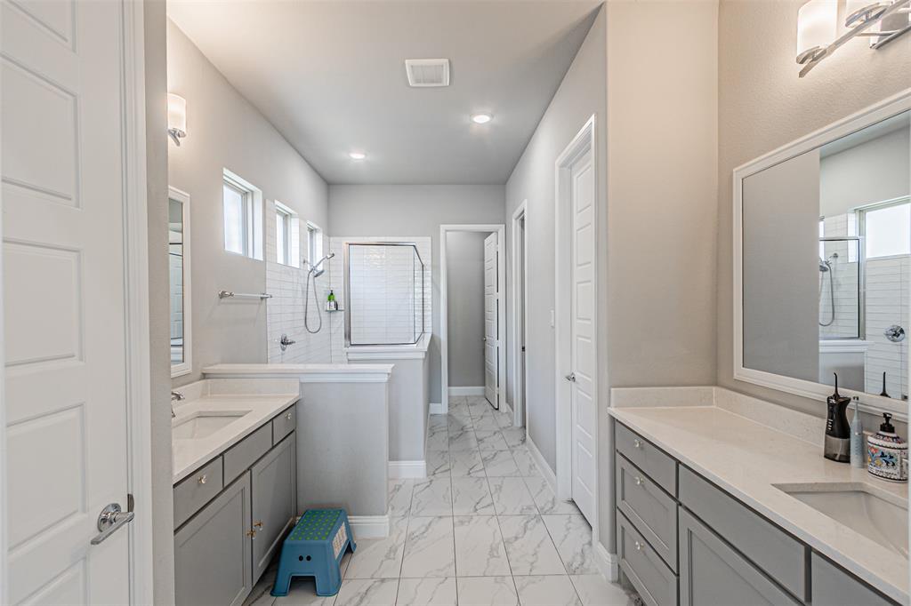 13237 Jonata Street Frisco, TX 75035 - Photo 24 of 39 a bathroom with a sink a toilet and shower