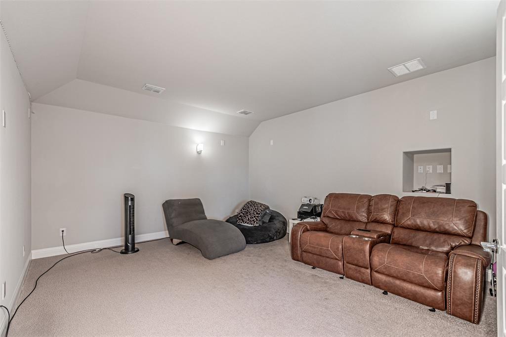 13237 Jonata Street Frisco, TX 75035 - Photo 27 of 39 a living room with furniture