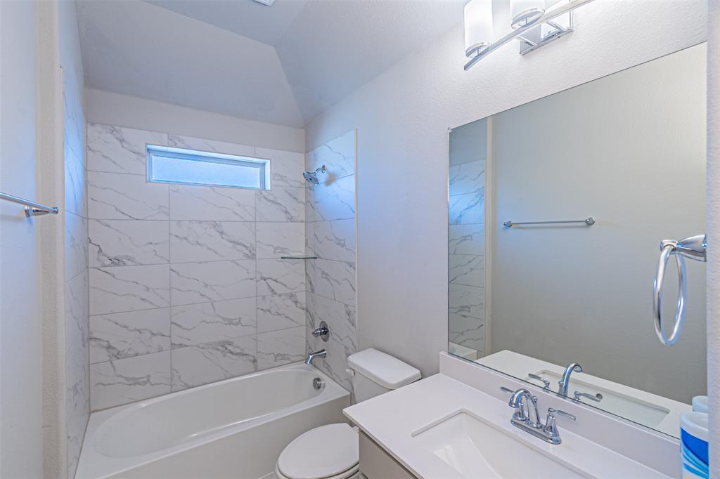 13237 Jonata Street Frisco, TX 75035 - Photo 32 of 39 a bathroom with a sink toilet and shower