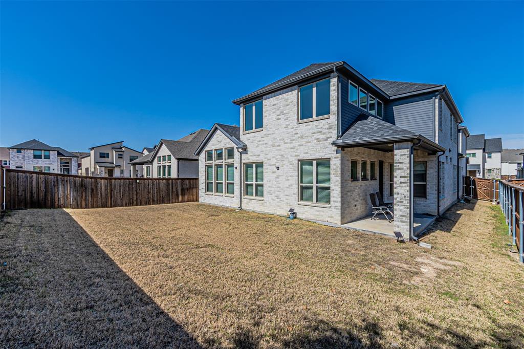 13237 Jonata Street Frisco, TX 75035 - Photo 37 of 39 a front view of a house with a yard