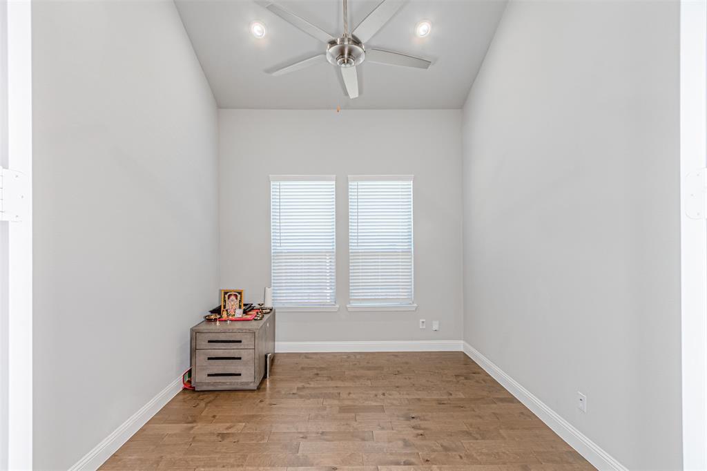 13237 Jonata Street Frisco, TX 75035 - Photo 9 of 39 an empty room with windows and fan