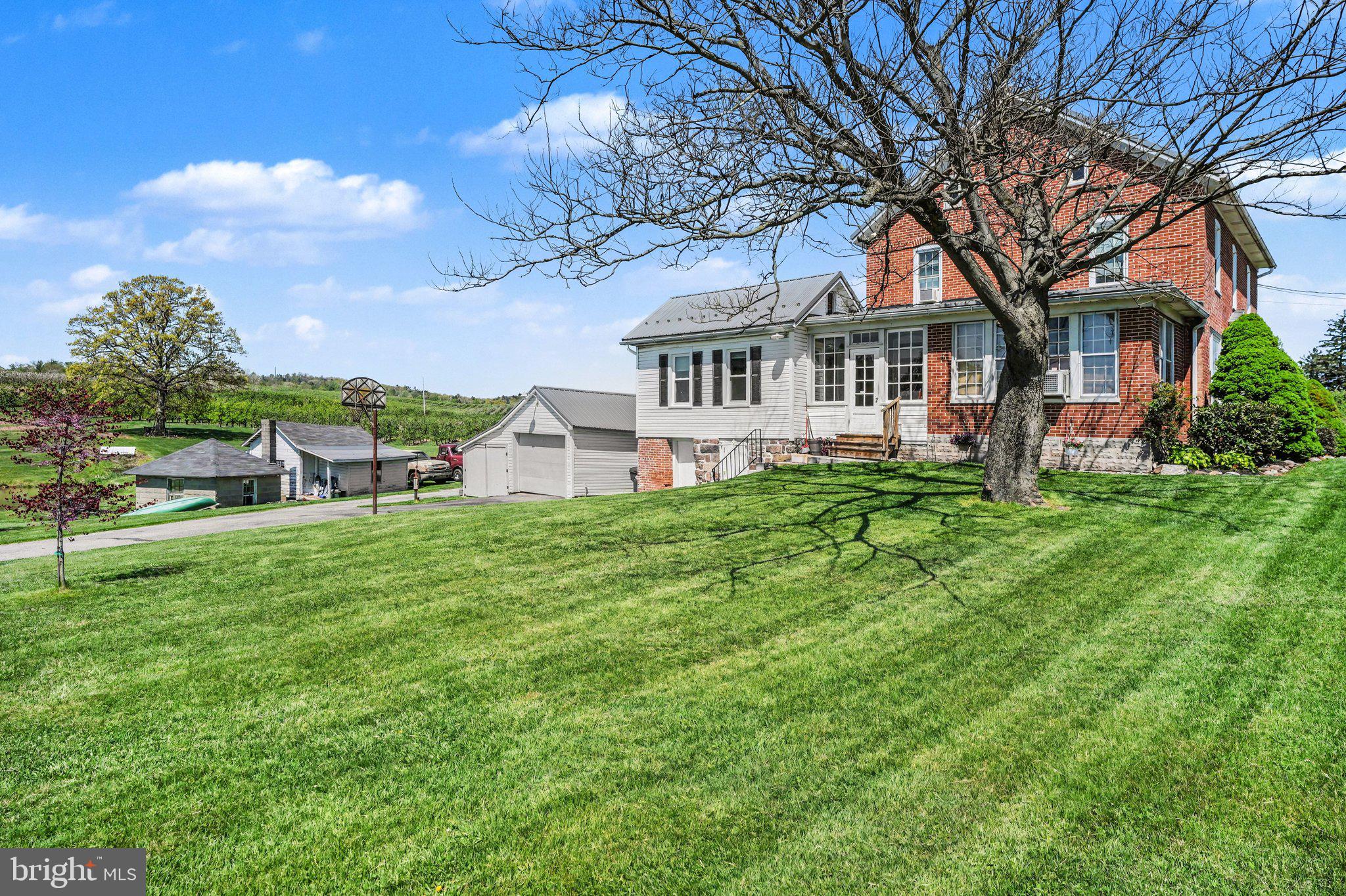 420 Carlisle Road Biglerville, PA 17307 - Photo 34 of 41 a front view of a house with garden