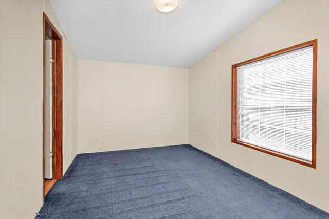 an empty room with closet
