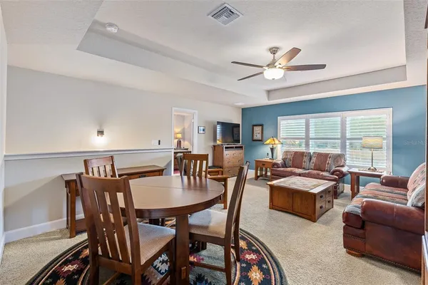 a view of a dining room with furniture