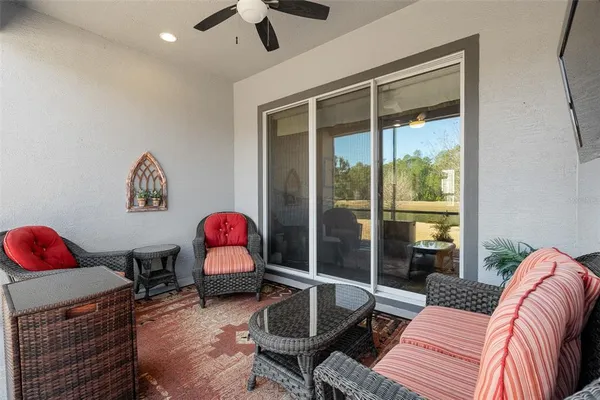a living room with furniture and a window