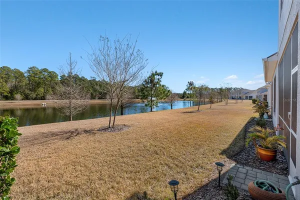 a house with river in front of it
