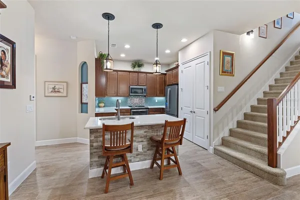 a view of a dining room with furniture