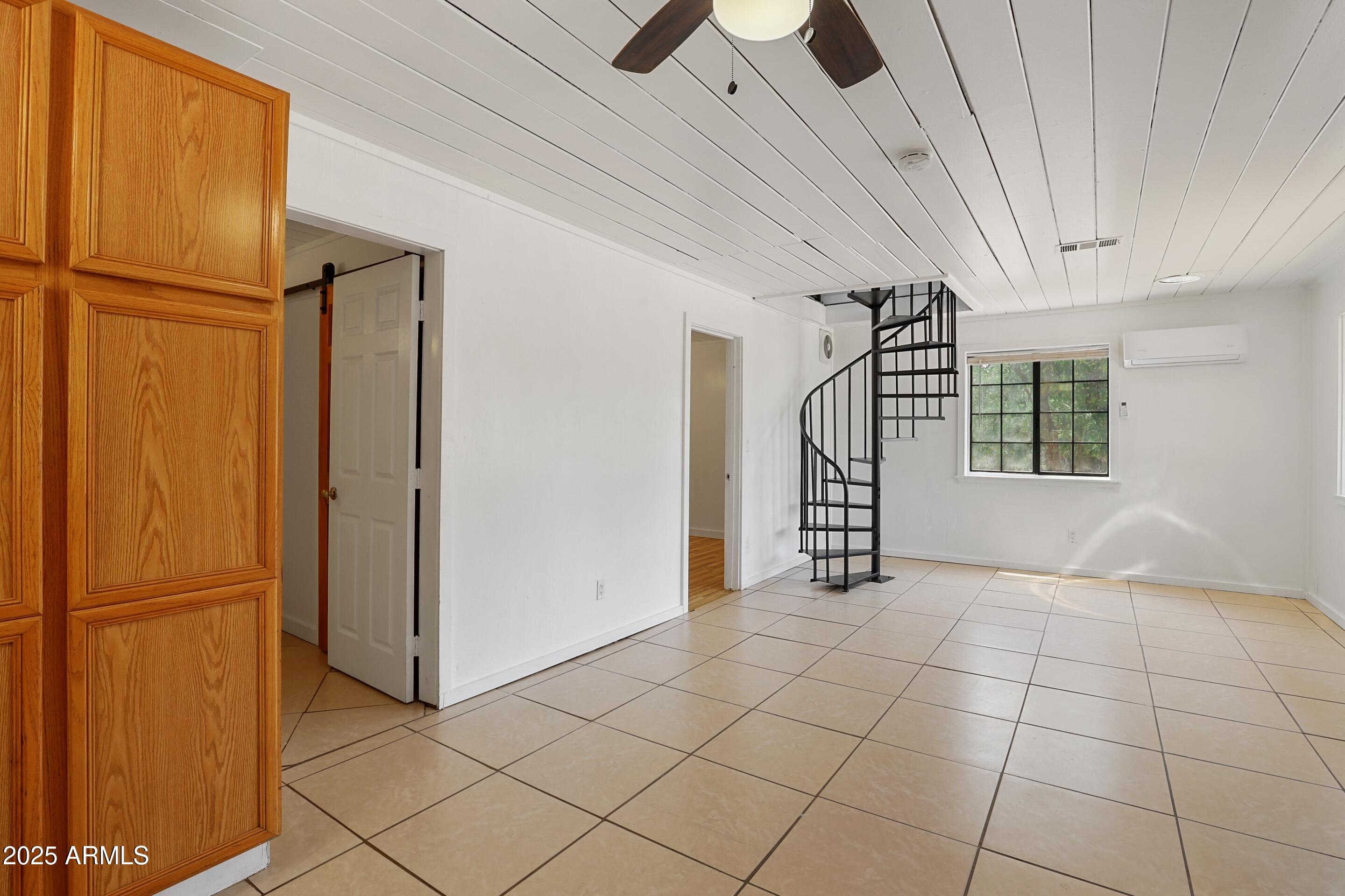 809 North Colcord Road Payson, AZ 85541 - Photo 14 of 34 a view of a livingroom with staircase
