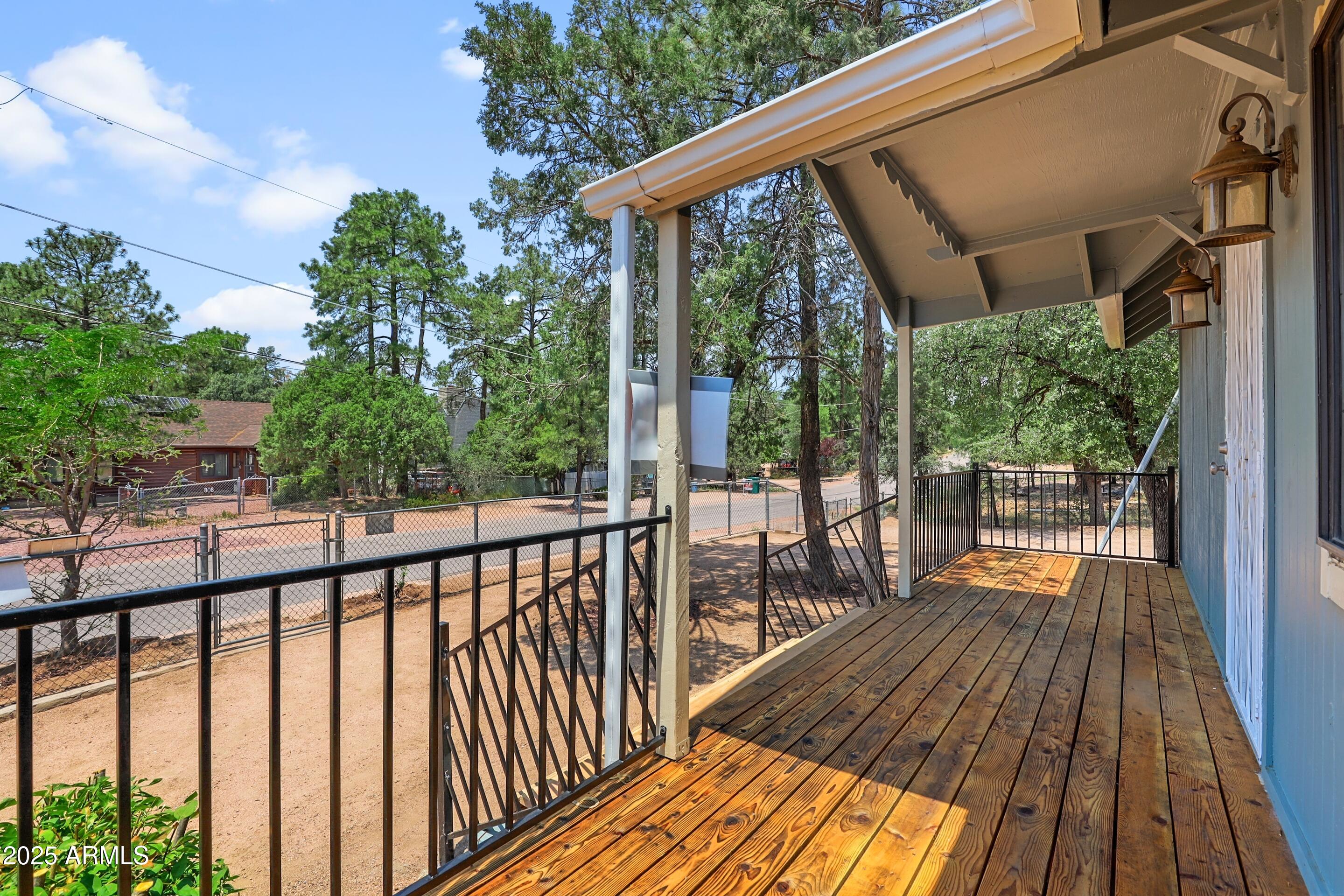 809 North Colcord Road Payson, AZ 85541 - Photo 3 of 34 a view of balcony with deck and wooden floor