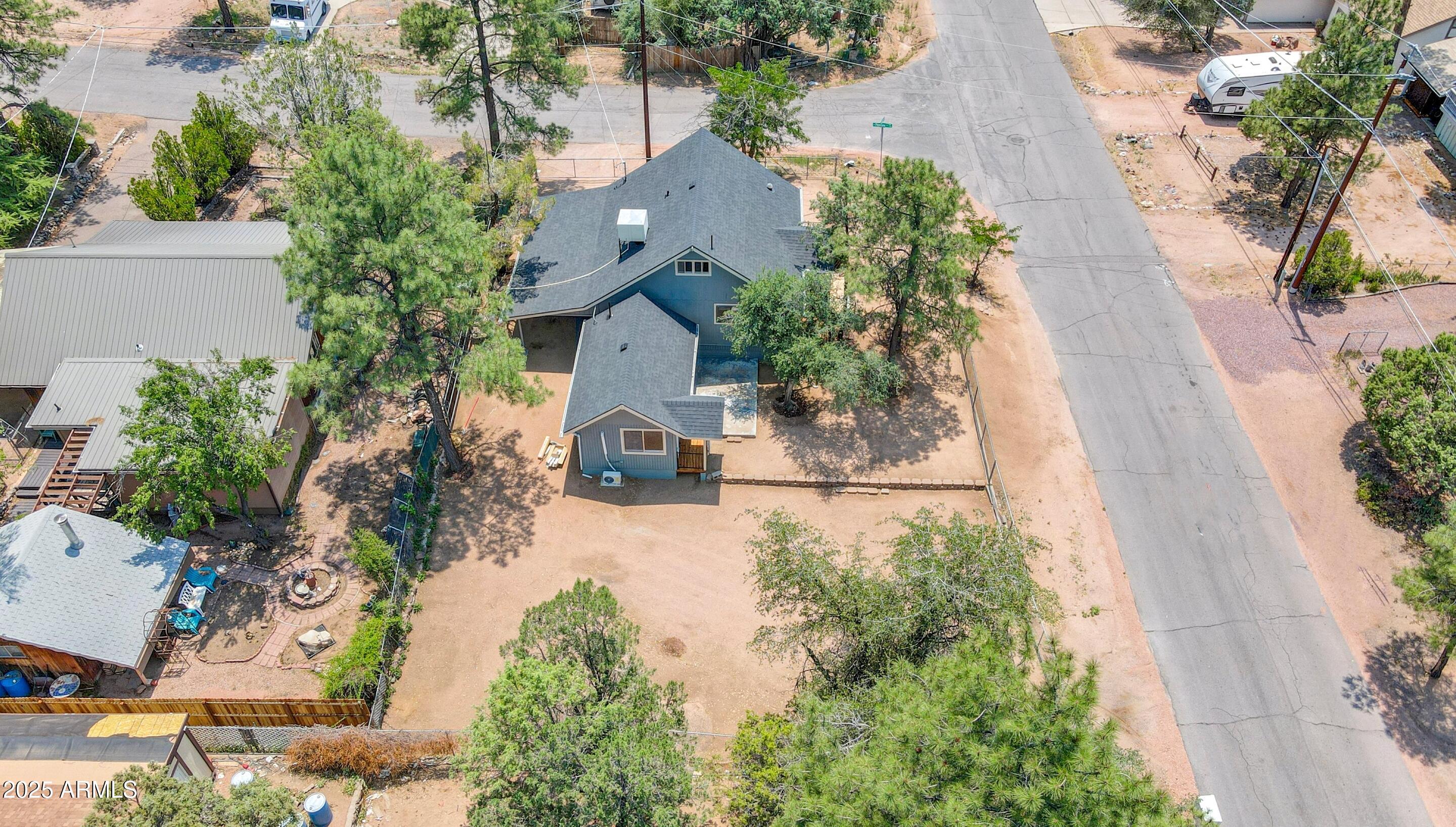 809 North Colcord Road Payson, AZ 85541 - Photo 32 of 34 an aerial view of a house with a yard and garden