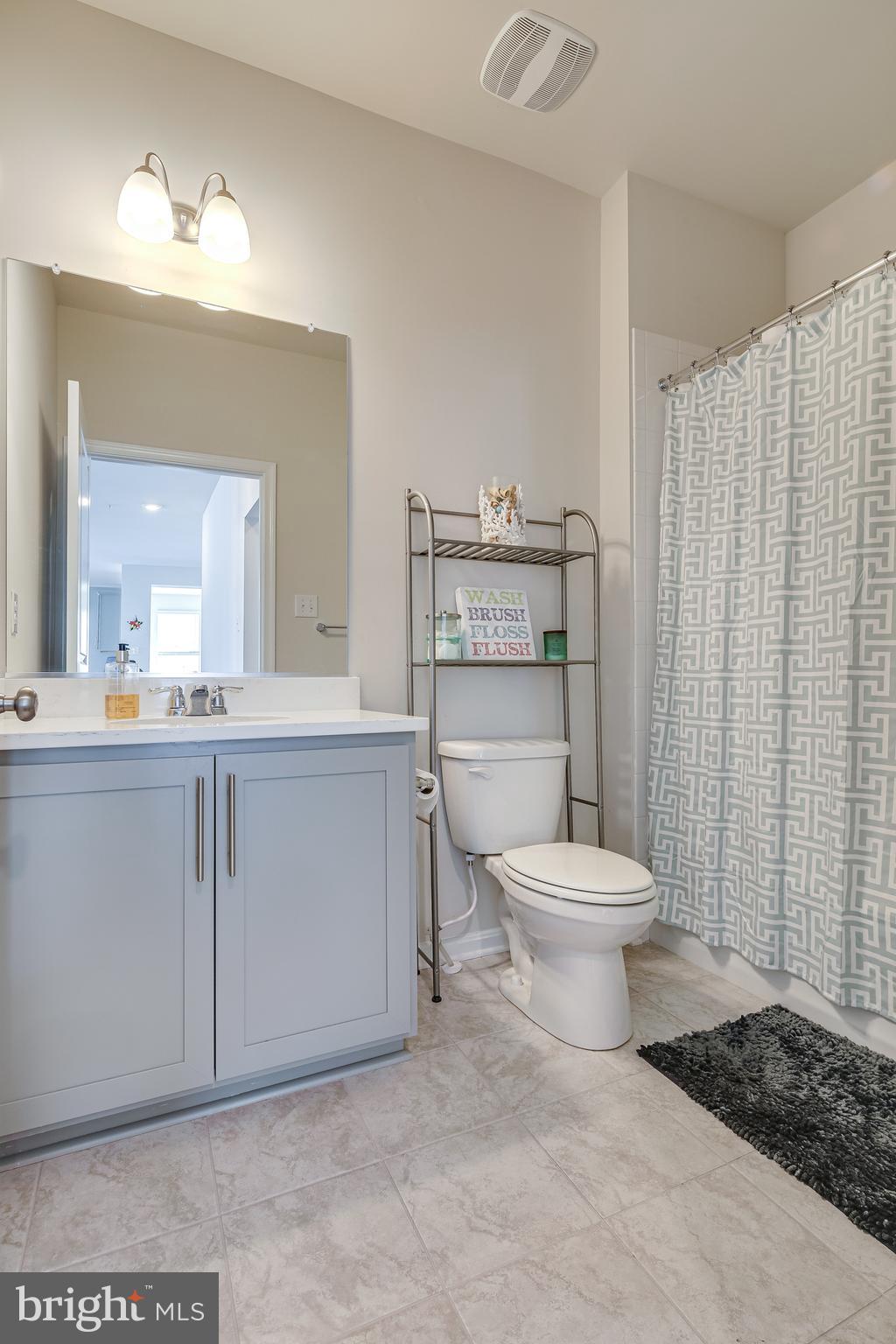 642 Friendship Road Westminster, MD 21157 - Photo 17 of 28 All bathrooms have modern Stone Gray cabinets