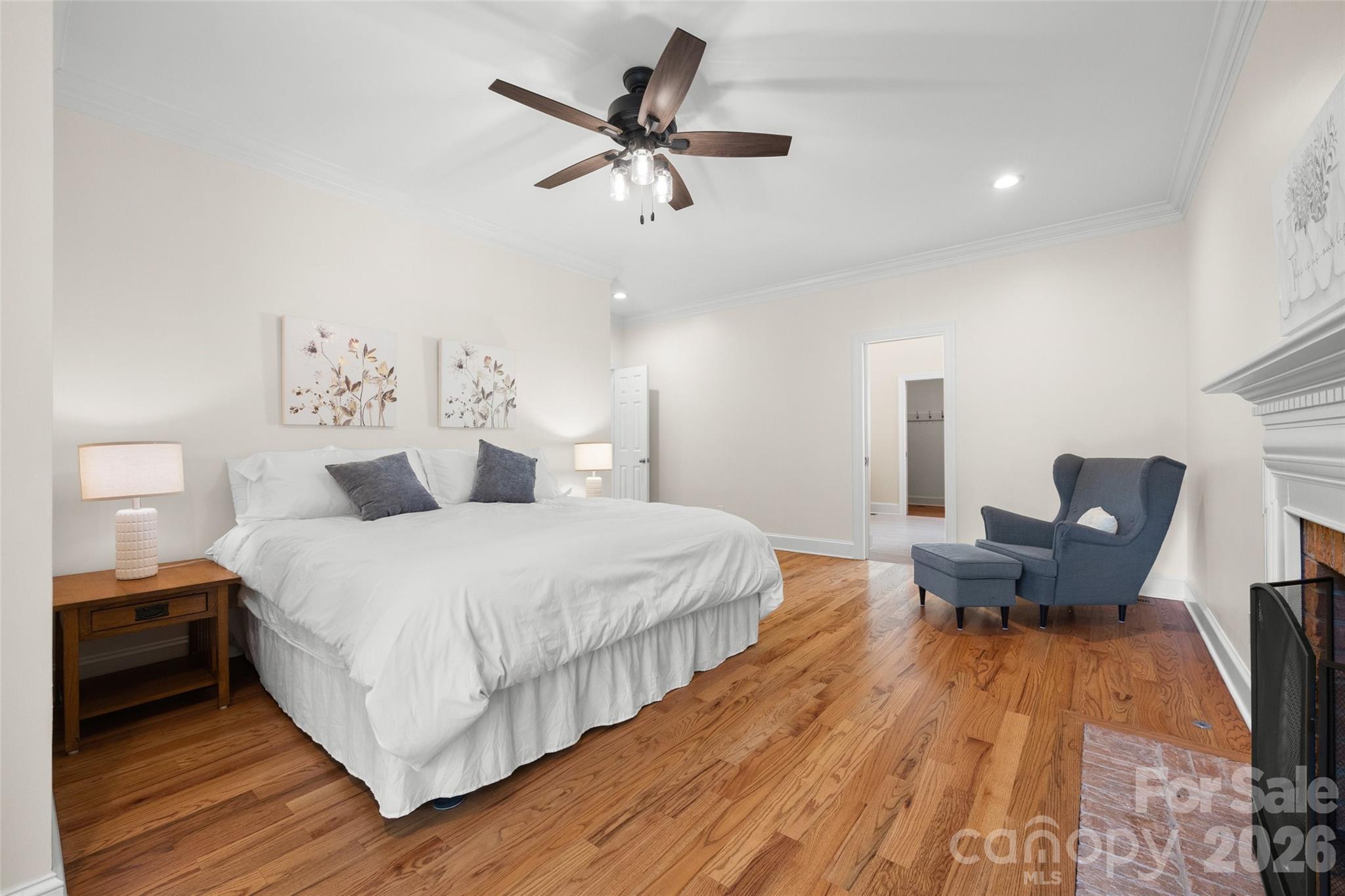 636 Landsdowne Court Fort Mill, SC 29708 - Photo 19 of 48 a bed room with a bed and a chair